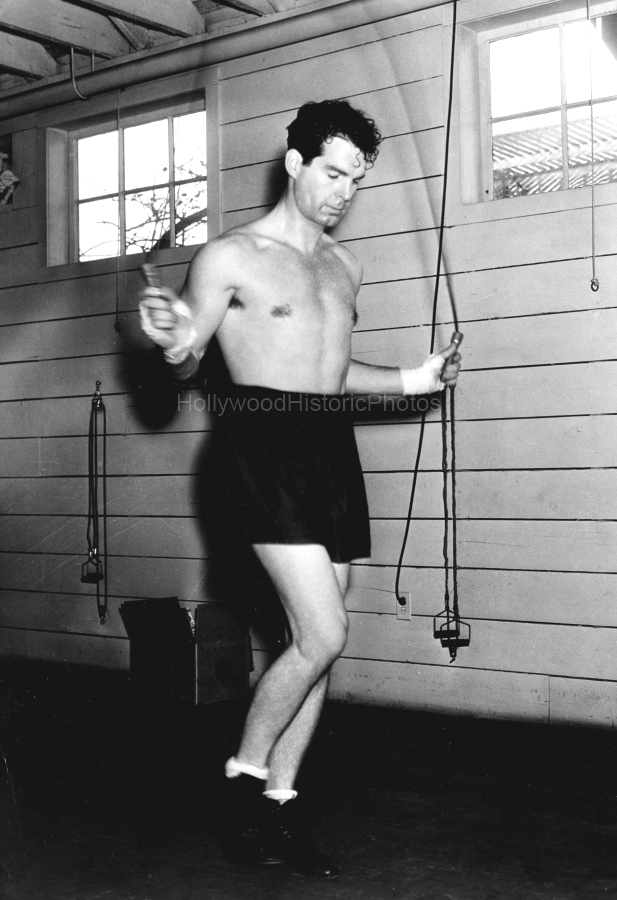 Fred MacMurray 1936 1  DeMille Barn Gym Paramount wm.jpg